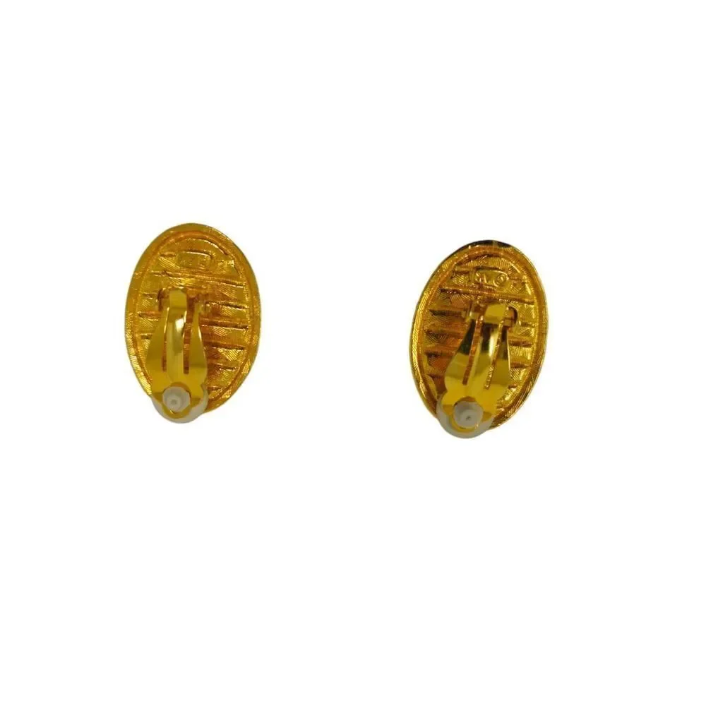 Vintage Anne Klein clip-on earrings featuring glossy black enamel ovals